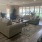 lobby with couches and open spaces and views of the pool