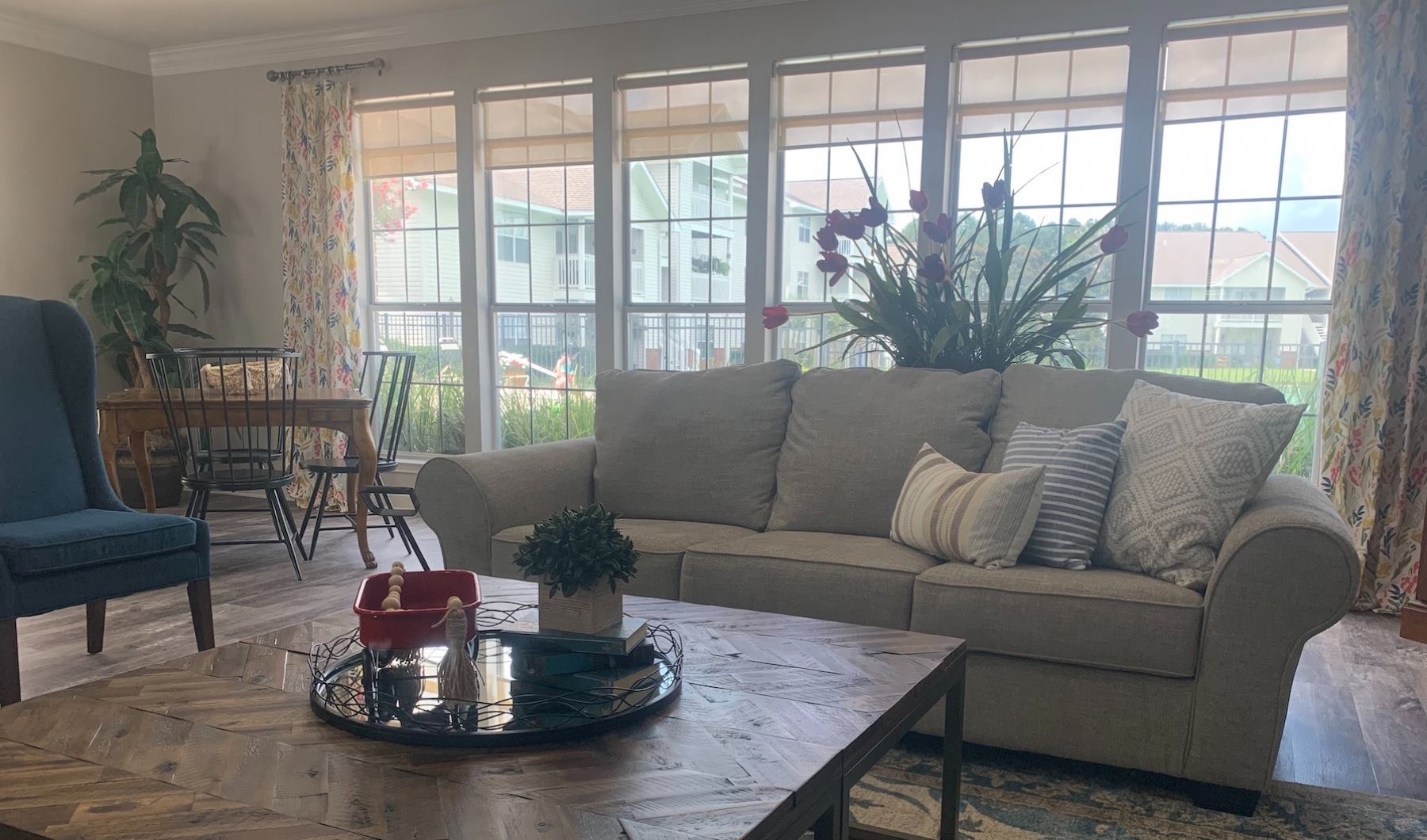 Lobby lobby with couches and open spaces and views of the pool